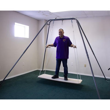 Man on Take a Swing Adult Glider Therapeutic Swing Seat in front view