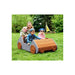 Family playing in the Haba Pro Speedy Wooden Indoor/Outdoor Play Car in green garden