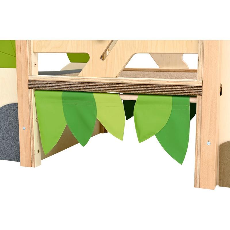 Green leaf fabric detail of the Moje Bambino Flora Mini Loft