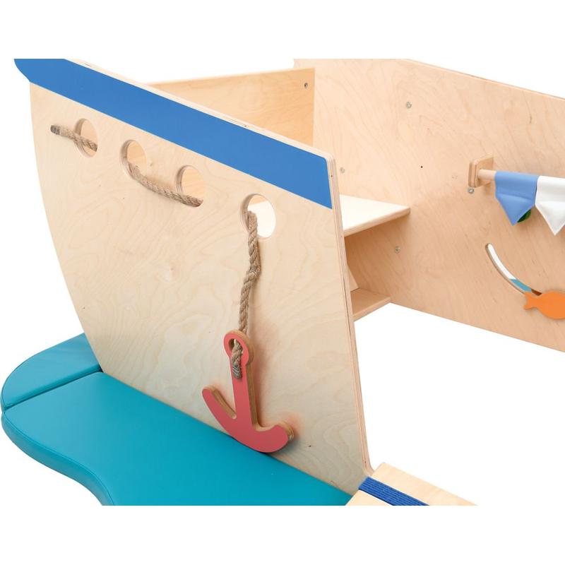 Children's wooden play boat with blue interior and accessories on a white background
