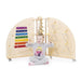 Child holding thumbs up in front of the Playscapes NOVUM Mini Music Island on white background