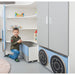 Child in front of the Playscapes NOVUM Truck Cabinet opening a drawer