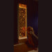child sitting in front of TFH Bubble Wall 60" with orange lighting