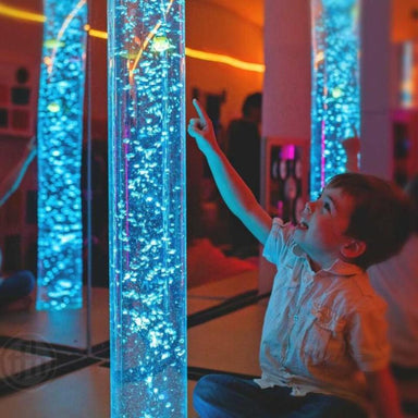 child playing with TFH Calming Bubble Tubes