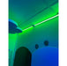 Neon green light strip TFH Genie Color Wash Kits on a ceiling with blue walls