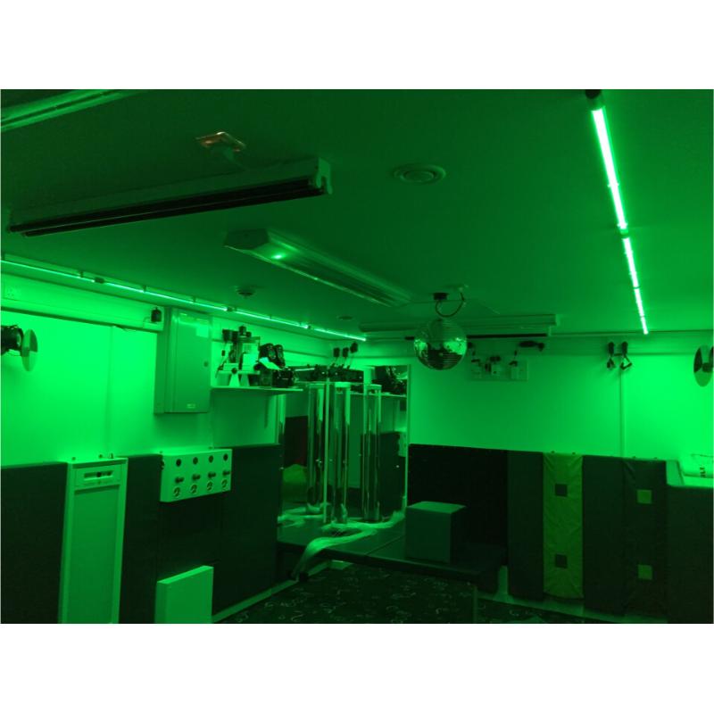 TFH Genie Color Wash Kit with green light in sensory room