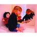 Mirrored image of a girl with a doll inside a TFH Portable Sensory Den