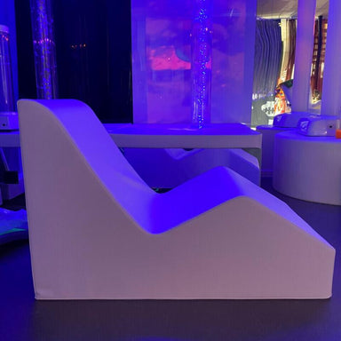 White TFH Relaxer Chair in a sensory room setup