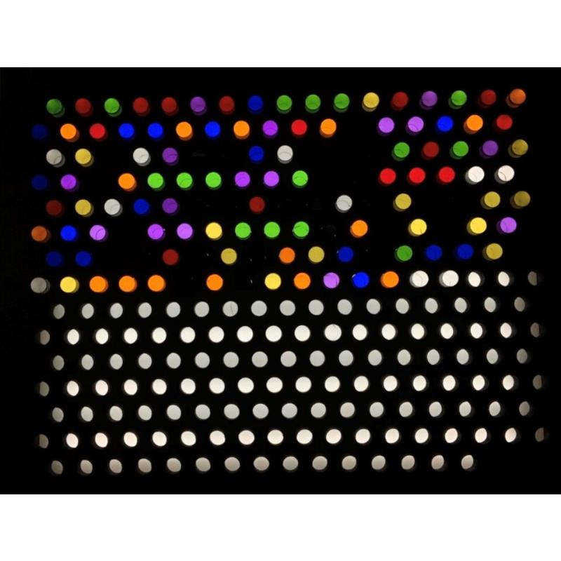 Colorful dot pattern on TFH Rod Wall Light Panel with pegs