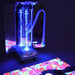 TFH Vecta Budii Mobile Sensory Station with blue lighting projecting colorful start to a dark floor