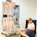 Boy sitting in front of a TFH Vecta Deluxe Mobile Sensory Station