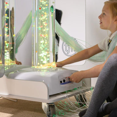 Girl playing with the TFH Vecta Deluxe Mobile Sensory Station
