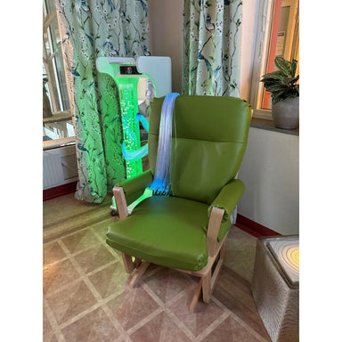 TFH Vecta Jr. Mobile Sensory Cart next to a green chair in a hospital setup