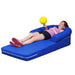 Girl lying on TFH Vibroacoustic Long Easy Lounger with yellow ball in hand