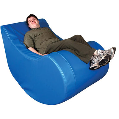 Person relaxing in a blue TFH Vibroacoustic Therapy Chair