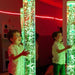 children playing with TFH Wireless Bubble Tubes with green lighting