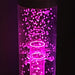 TFH Wireless Hurricane Tube with pink light in dark sensory room