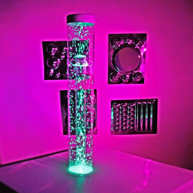 TFH Wireless Hurricane Tubes on podium with pink light in sensory room